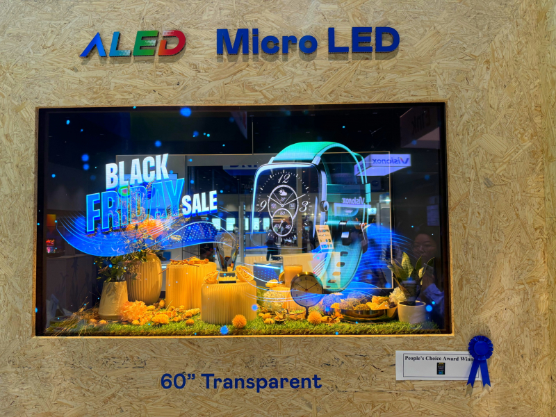 球盟会60吋高透明度Micro LED显示器获”最佳Micro LED技术应用奖”，将Micro LED面板透明化之设计特性极致发挥，以可扩展性无缝拼接技术打造，具备600 nits全画面亮度、大于60%穿透率及超过NTSC 110%的优异广色域表现，可依需求灵活应用于各种场域